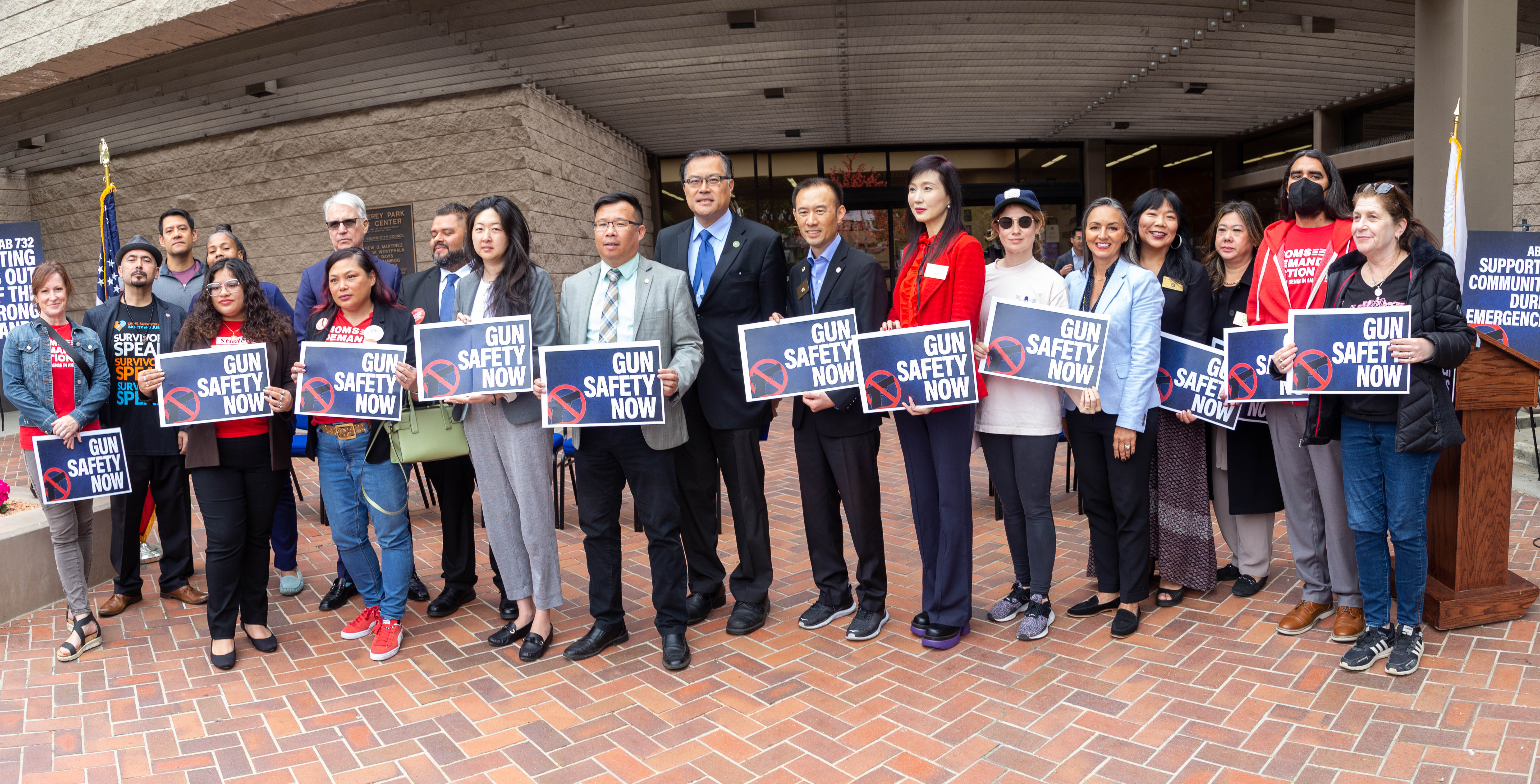 Assemblymember Mike Fong stands alongside supporters.