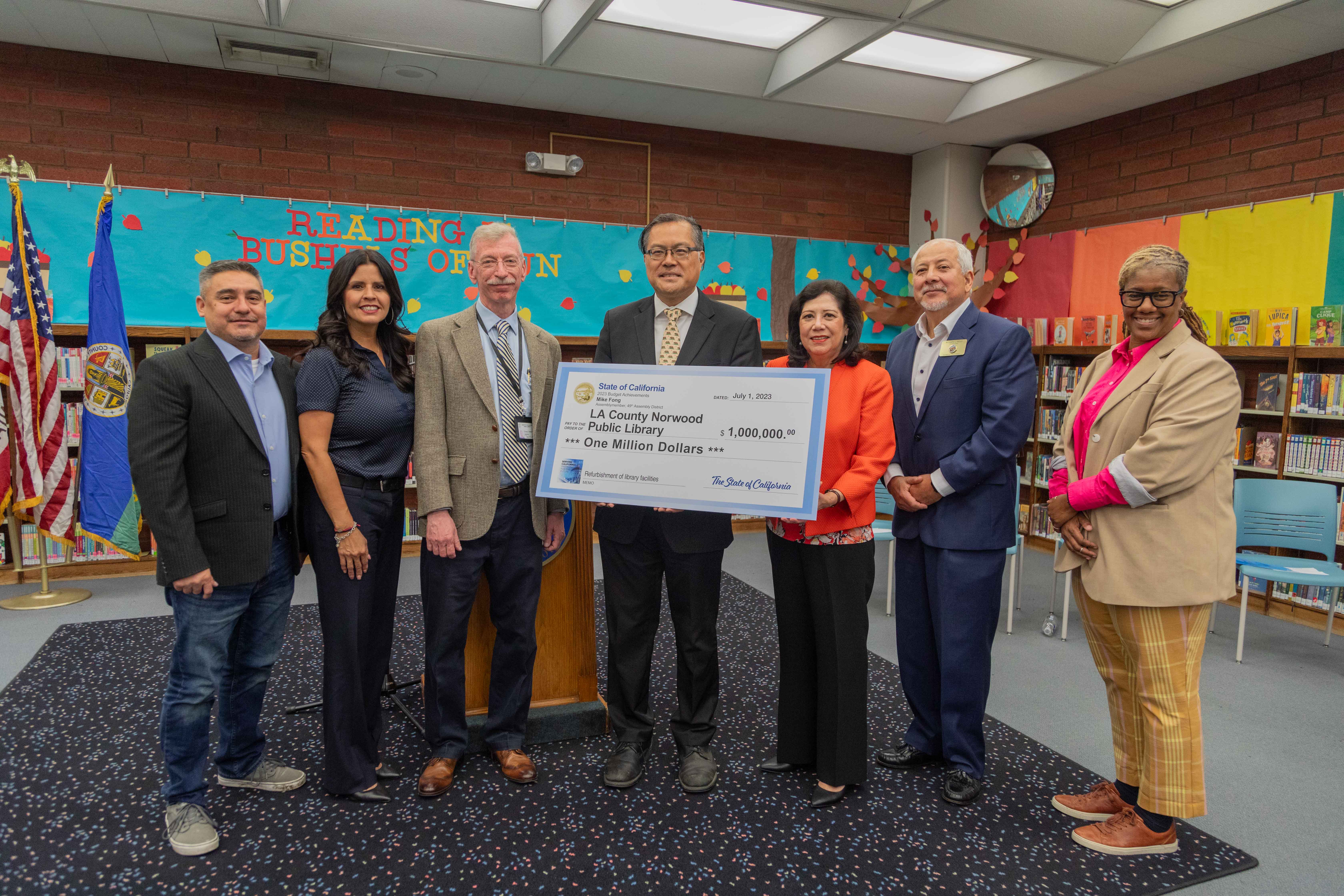 Assemblymember Fong presents a check at Norwood Library