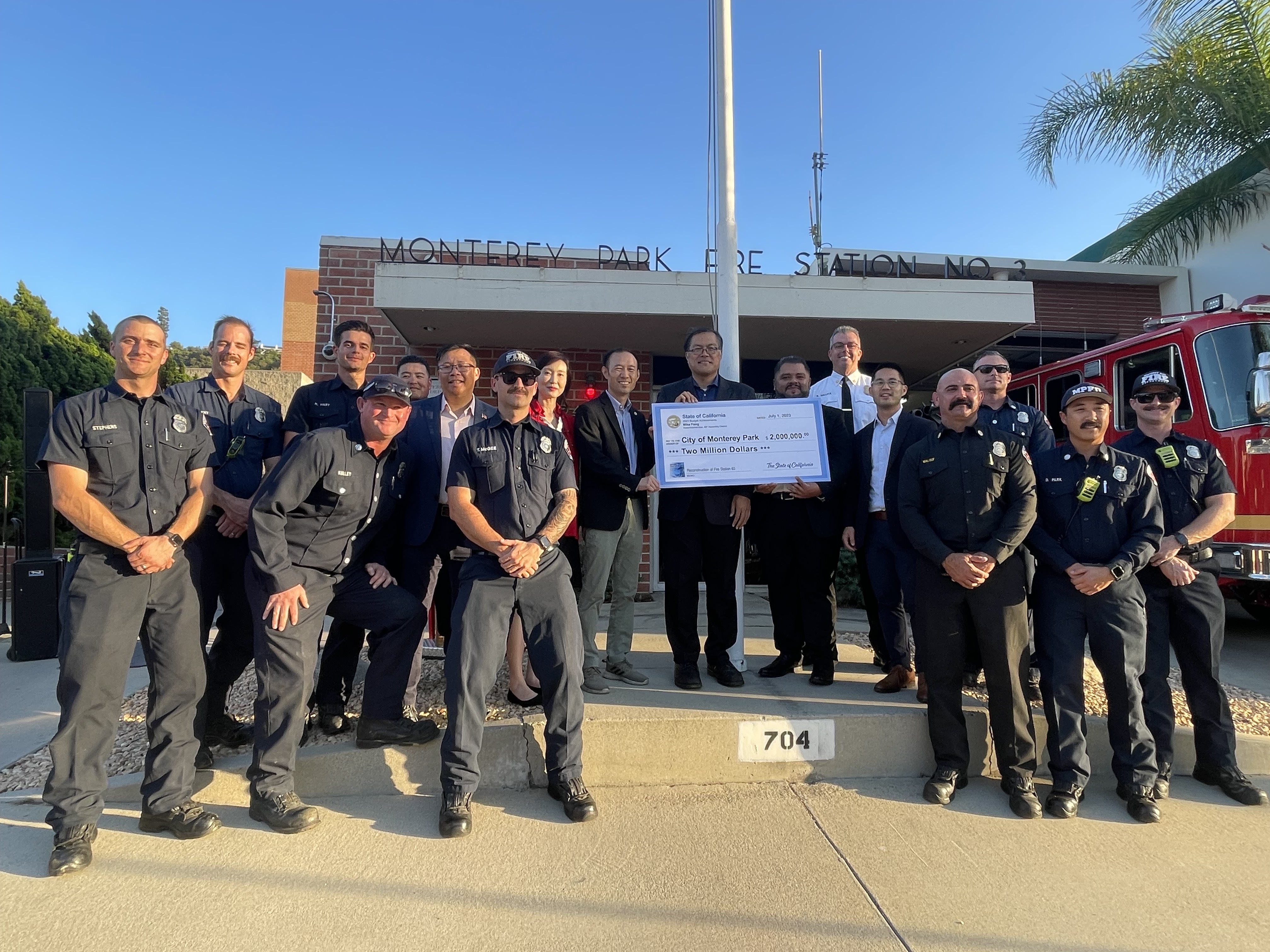 Assemblymember Fong presents a check to the Monterey Park Fire Department