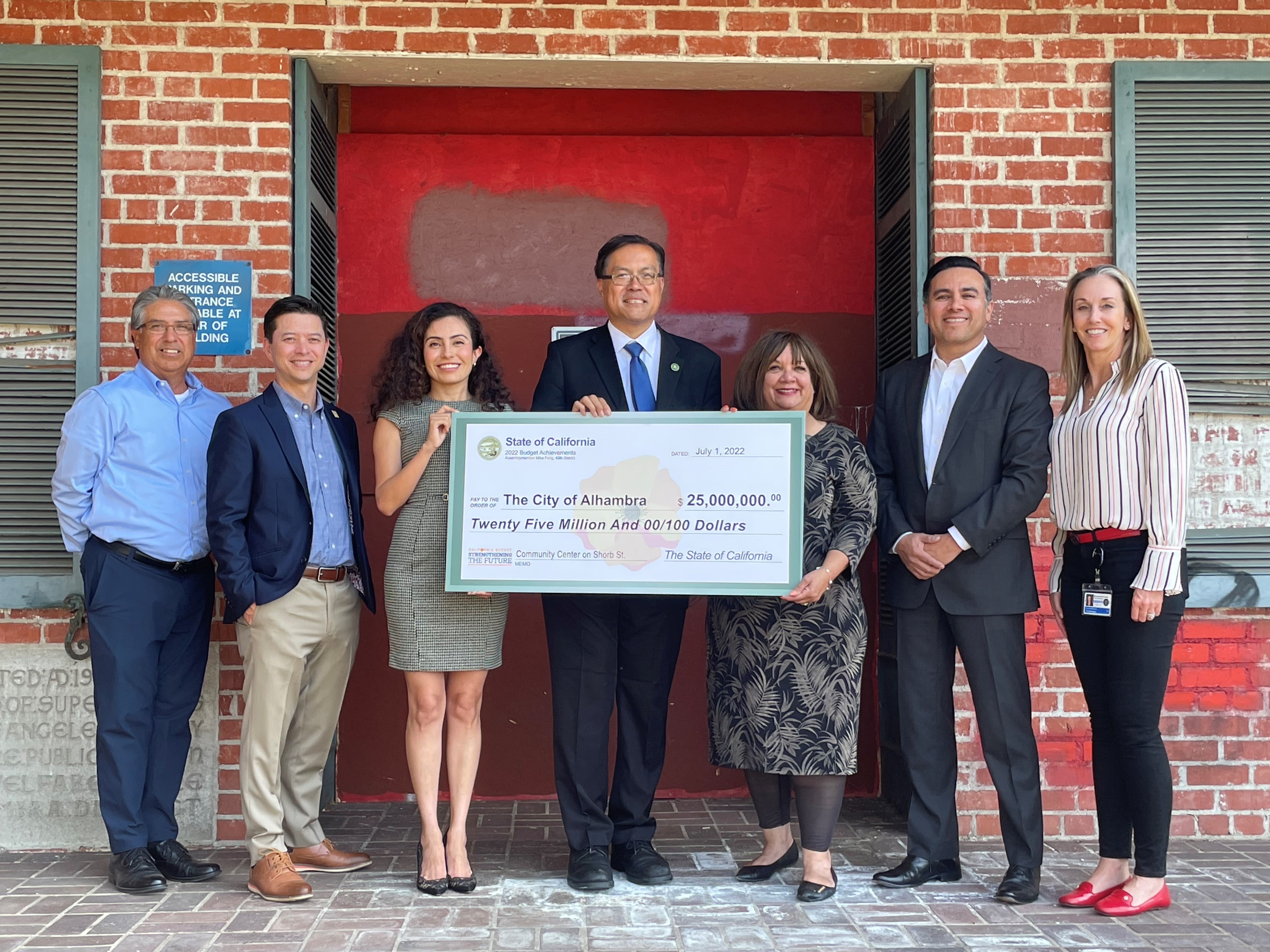 Assemblymember Fong presents a check to Alhambra City Council